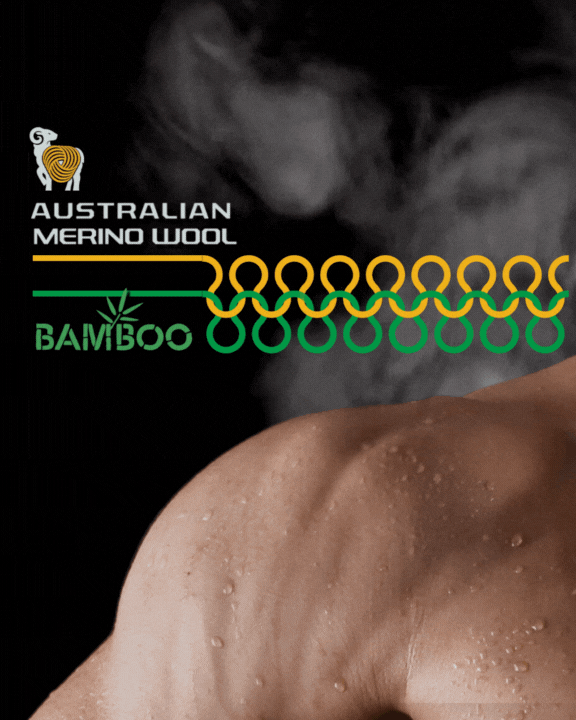 Close-up of a muscular mans shoulder wearing an Australian Merino Wool and bamboo fabric. The logo and text indicate a blend of materials, suggesting a focus on natural, comfortable, and durable clothing.