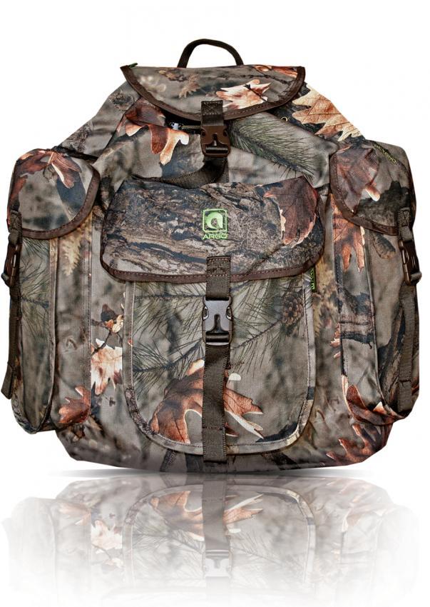 The Hillman Hunting Backpack ARGO® Camouflage is made of durable fabric, featuring multiple pockets and a buckle strap. It has a green logo patch on the front flap and an earthy color palette, resembling a forest setting.