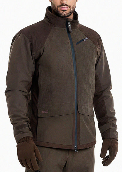 A man stands against a white background wearing the Fusion Hunting Jacket with dark brown sleeves and shoulders, paired with matching brown gloves and pants. His face is partially visible.