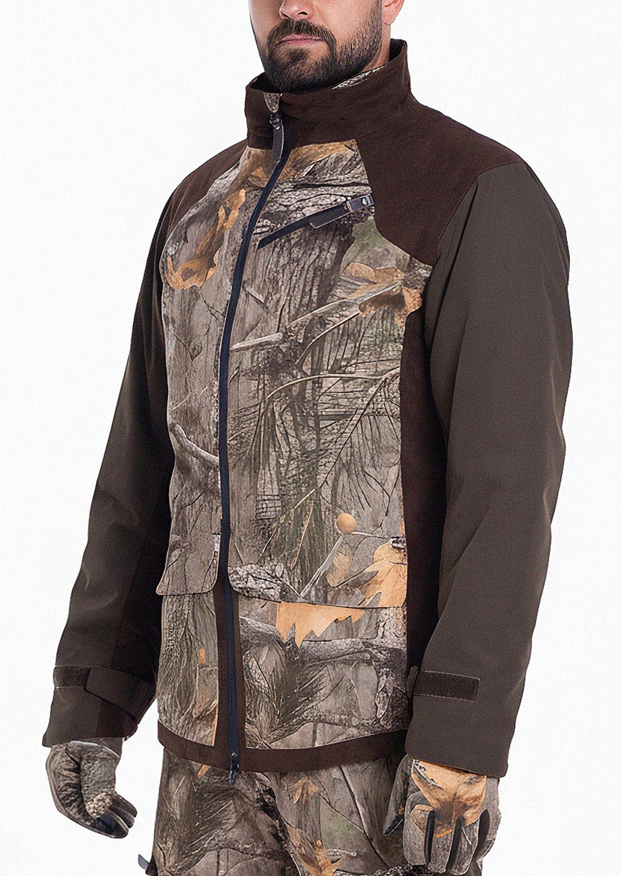 A man wearing the Hillman Fusion Hunting Jacket 3DX with brown sleeves, matching gloves, and pants—perfect for hunting or outdoor activities—stands against a plain white background.